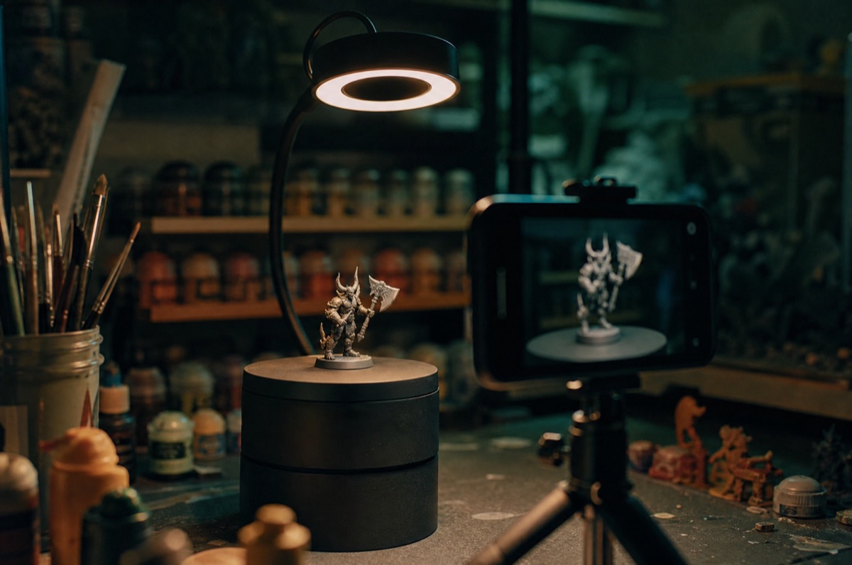 A miniature under a ring light being photographed for a colour scan